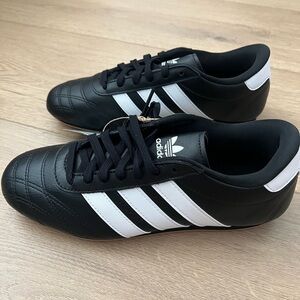 Adidas Women’s Black Athletic Shoes with White Stripes